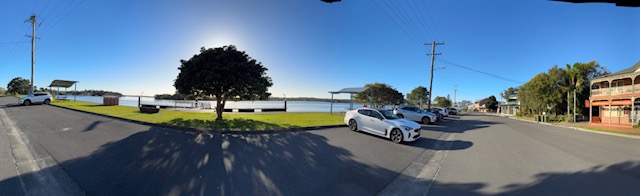 Tea Gardens street panorama with river views